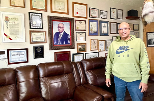 Alex’s son, Will Pitcher, in the den of his Bayview home where his father’s awards, certificates of honor, and commendations from an array of organizations that include the San Francisco Board of Supervisors are carefully and proudly displayed.