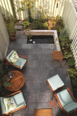 small concrete tiled garden area