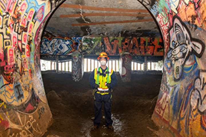 SFPUC employee inside sewer pipe