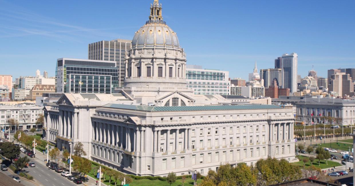 San Francisco City Hall building and view of San Francisco