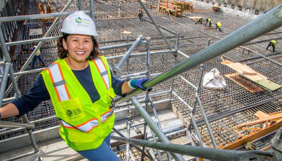 Carolyn Chiu standing at the site of the Southeast Treatment Plant, Biosolids Digester Facilities project