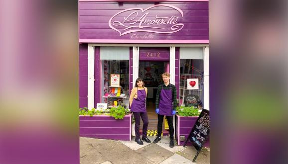 Co-owner Roxanne and Michael in front of L’Amourette Chocolat’s brick and mortar 